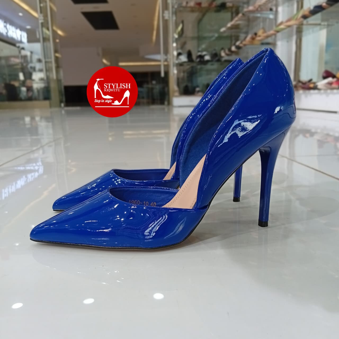 Royal blue patent leather stiletto pumps