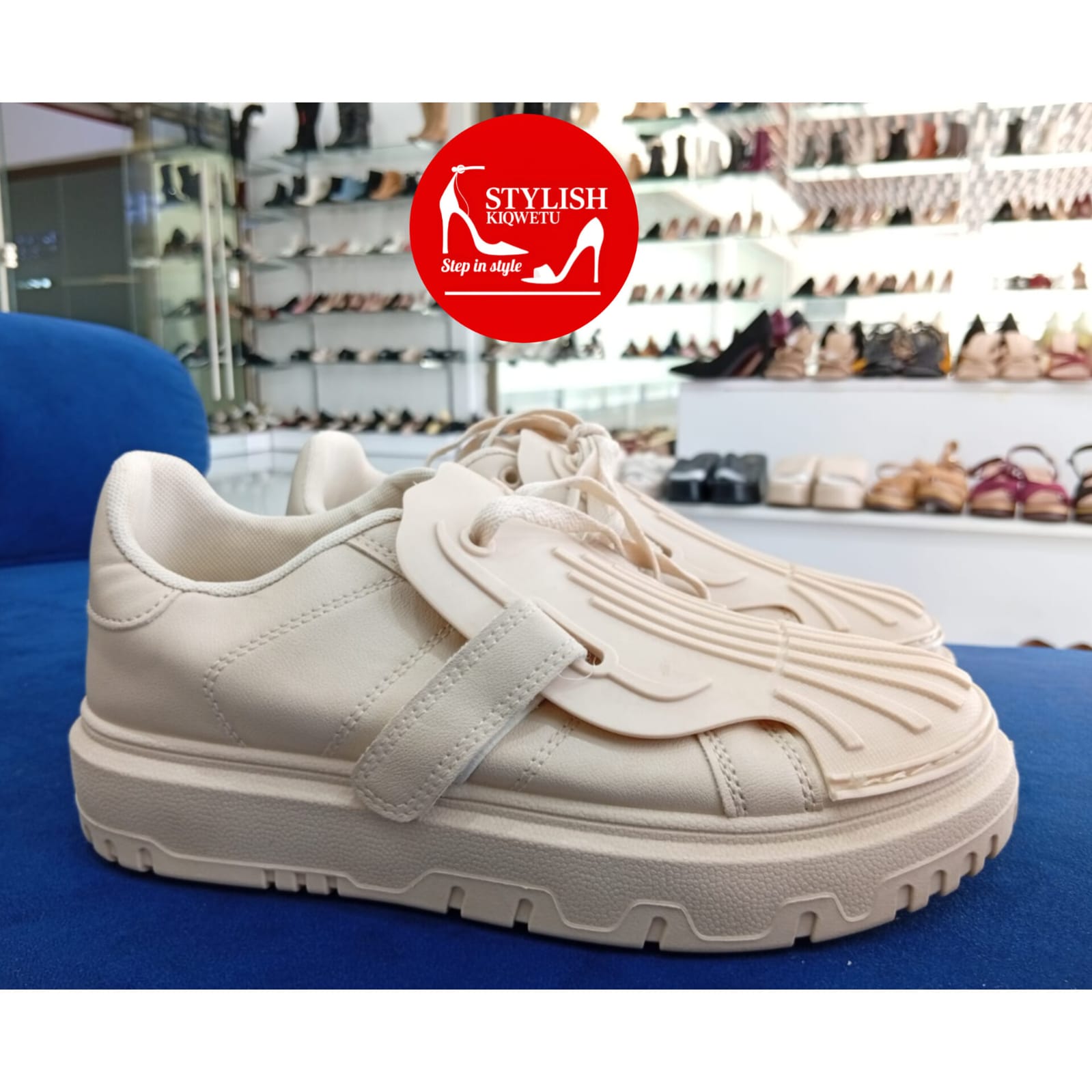 Monochrome cream sneakers.